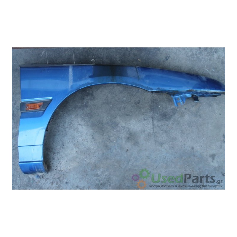 MAZDA- 323- Φτερό-Μπροστά Δεξιά-ΜΕ ΦΛΑΣ-1991